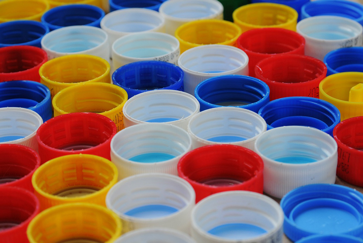 Small caps on plastic bottles